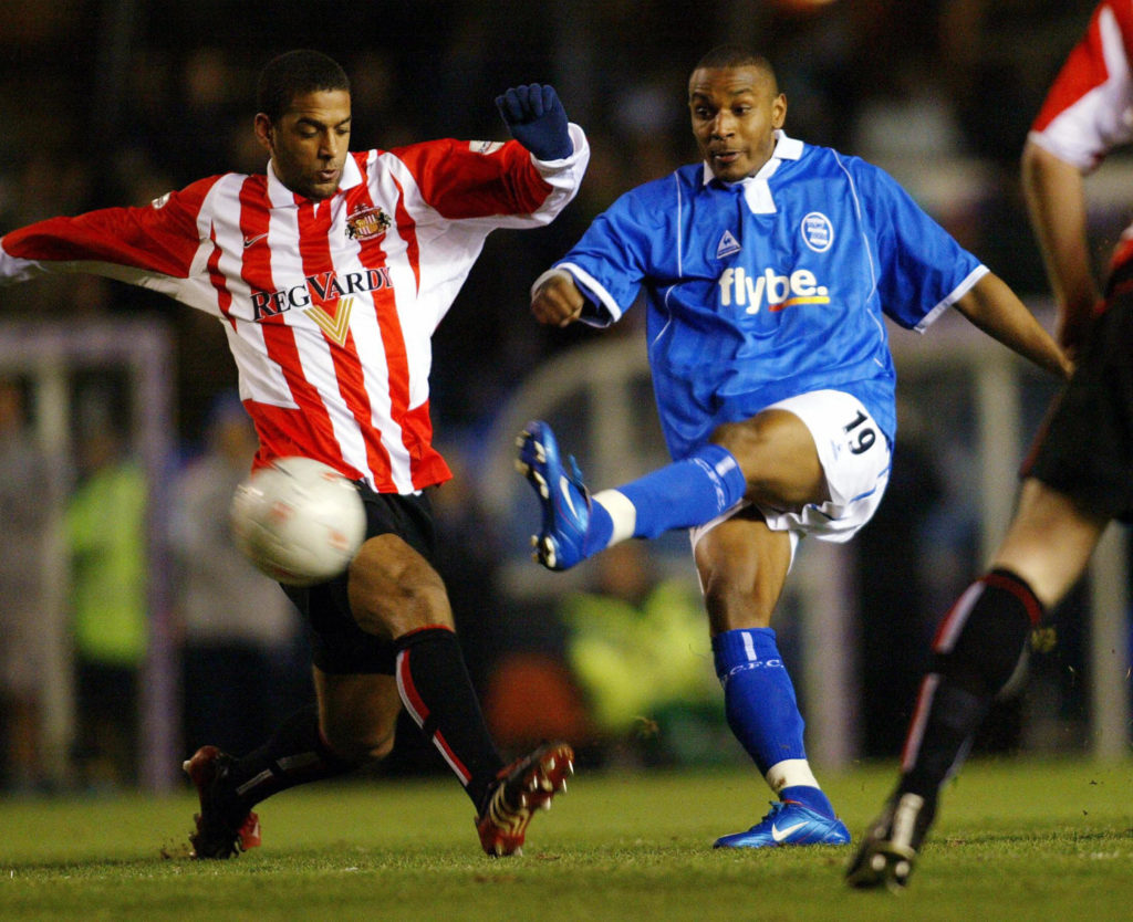 Birmingham City's Clinton Morrison (R) v